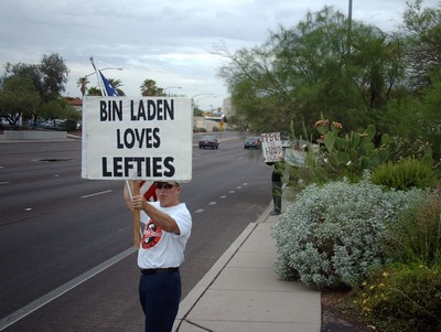 Pro-American with sign 'Bin Ladin loves lefties'